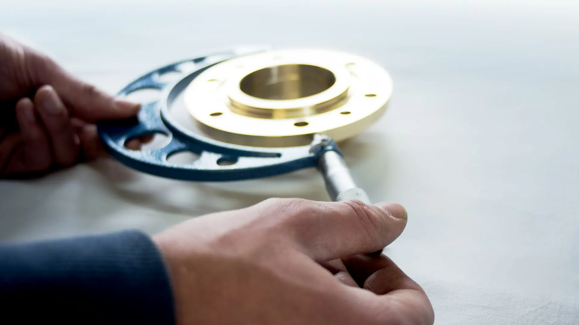 a person is working on a metal object